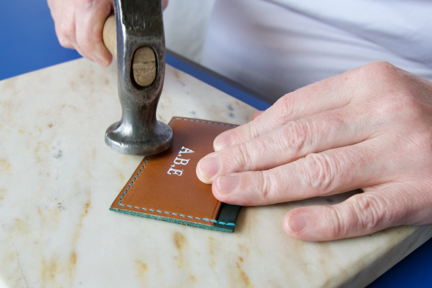 leather craftsman flattening stitches