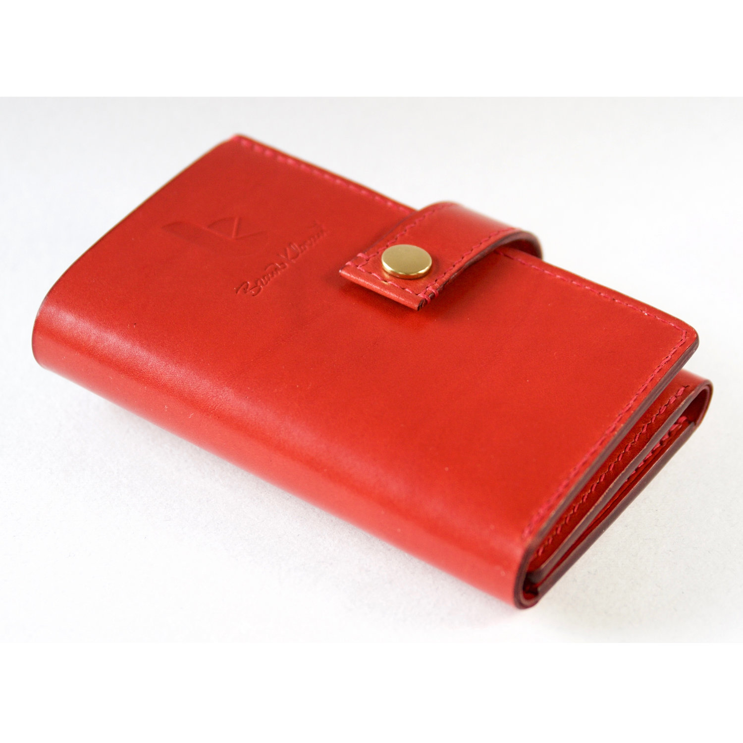 red leather trifold wallet